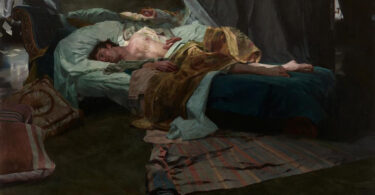 Man sleeping or resting shirtless on a four-poster bed with draped linens in a dim room. Exposed arm and relaxed posture suggest exhaustion or illness.